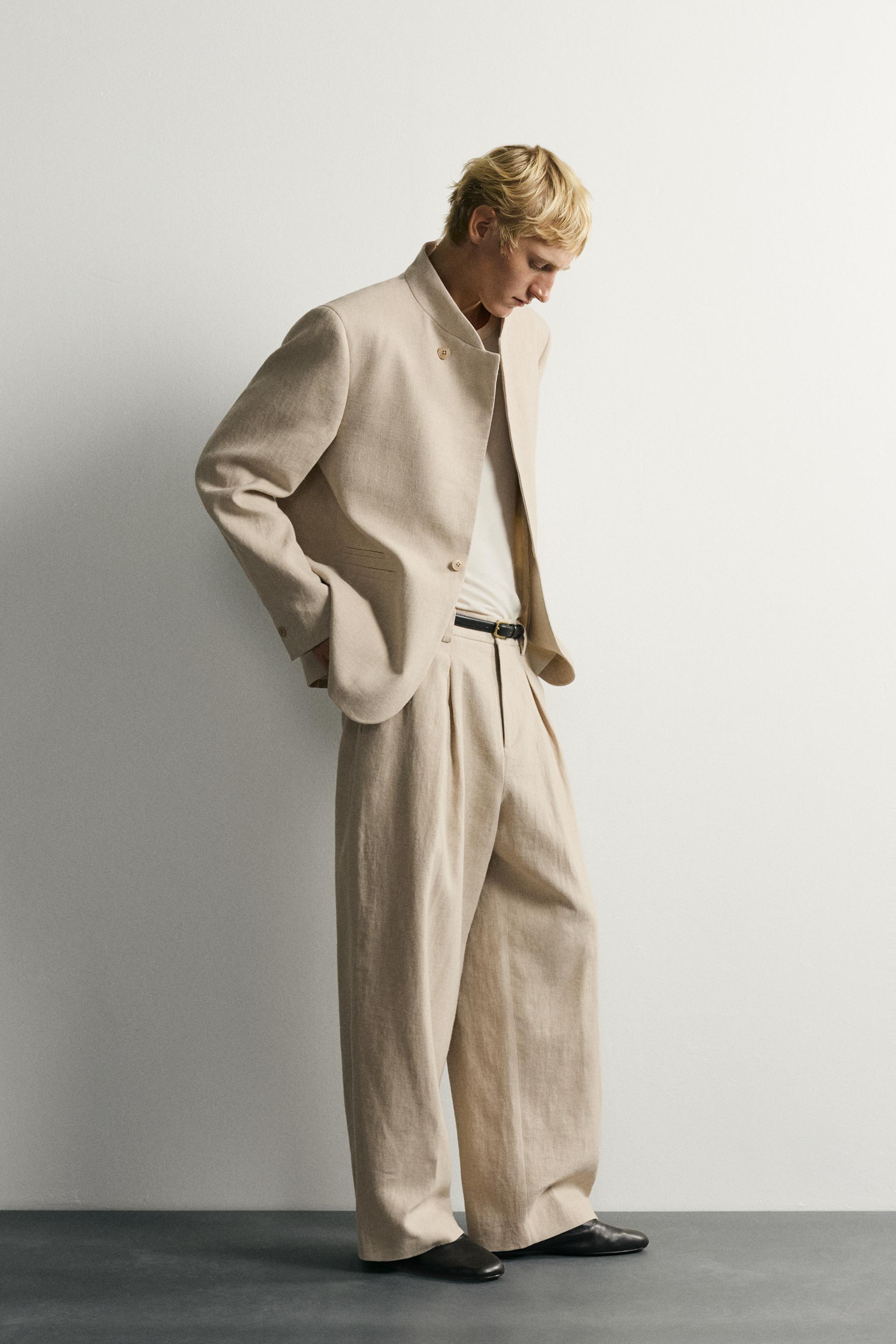 RELAXED FIT PLEATED SUIT PANTS